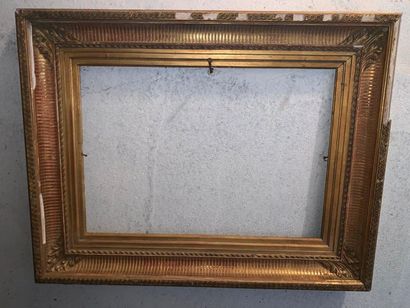 null Set of two frames, one in wood and gilded stucco with rich foliage decoration...