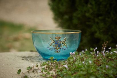 null Cup in blue tinted glass with golden rim and polychrome decoration of coat of...