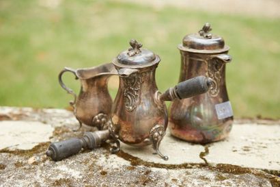 null Silver lot including two selfish jugs and a milk jug decorated with shells,...