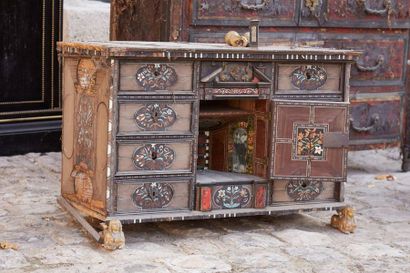 null Veneer cabinet with inlaid decoration of reserves opening with ten drawers and...