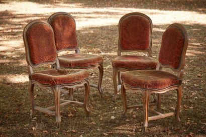 null Four dining chairs in moulded natural wood, orange velvet upholstery, curved...