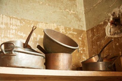 null Copper kitchen utensils including pots, pans and moulds.



Provenance: Castle...