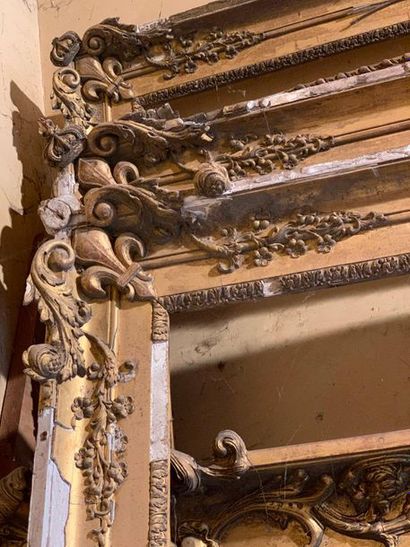 null Two very large frames with fleur-de-lys spandrels in wood and golden stucco...
