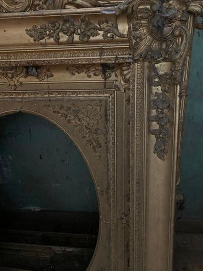 null Two Louis XV style wooden frames with gilded stucco, spandrels decorated with...