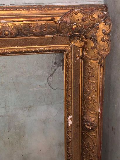 null Two gilded wood and stucco frames, one with channels, the other in the Louis...