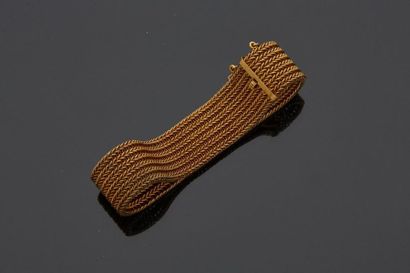 null Bracelet articulé en or jaune 18 k (750 millièmes) à 6 mailles "chevrons". Chaînette...