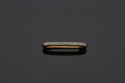 null 18 k (750 thousandths) yellow and white gold brooch set with a line of small...