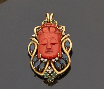 null Pendant "Buddha head" in carved red coral mounted in 14 k (585 thousandths)...