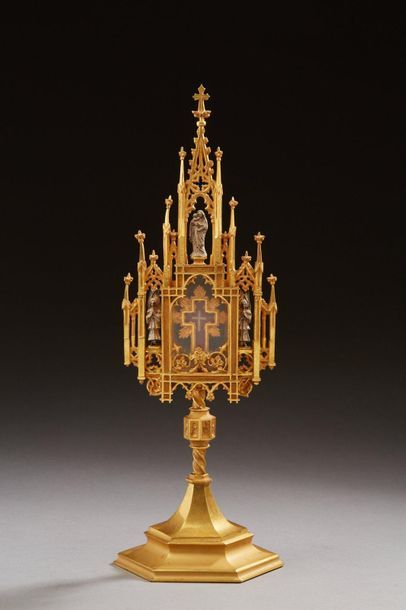 null Gilded bronze monstrance with neo-Gothic openwork decoration adorned with a...