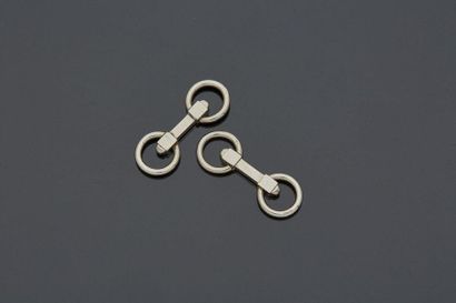 null Paire de boutons de manchette en argent rodié.

Travail français

Poids : 9.6...