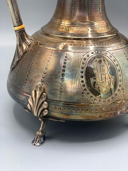 null HUGO, Middle Eastern style silver pot with a decoration of circular striations...