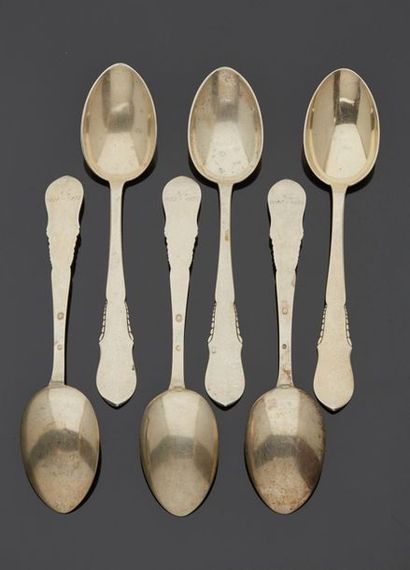 null 6 large silver spoons with hammered and violin decoration, the spatulas engraved...