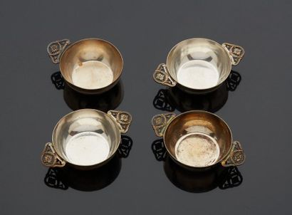 null LEVERRIER Paris

Four small cups in silvery metal, the handles with openwork...
