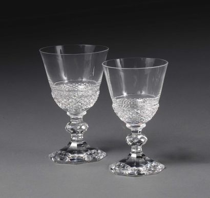 null Part of a service of cut crystal stemmed glasses, lower part with diamond points....