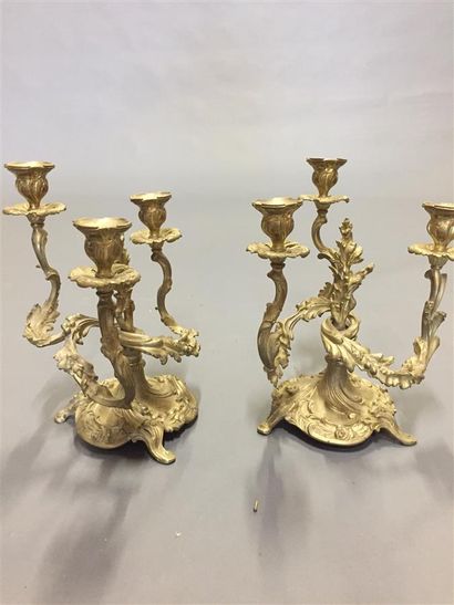 null Two sclupted and gilt bronze candelabra with three arms of light in an animated...