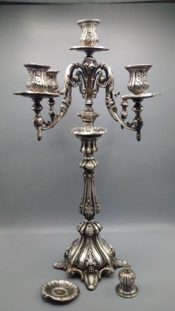 null Pair of five-light candelabra in silver-patinated metal, rocaille decoration...