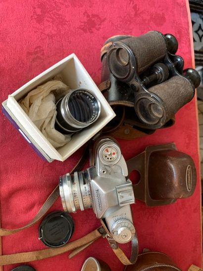null Set includes: Voigt Lander Bessamatic camera, pair of binoculars, 1:4/135 superdinarex...
