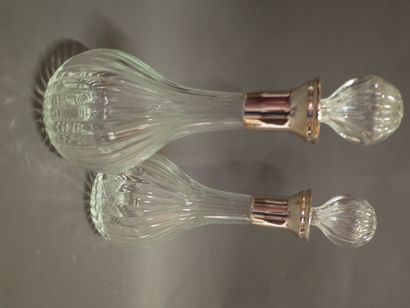null Pair of blown glass decanters, metal frame.

(A broken cork)

Height: 34.5 ...