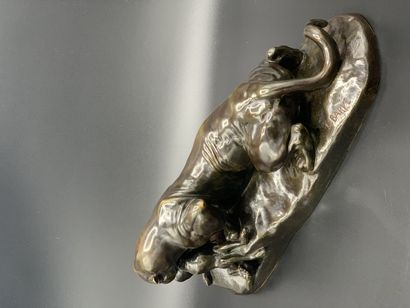 null According to Antoine Louis BARYE

Panther devouring a hare

Bronze with brown...