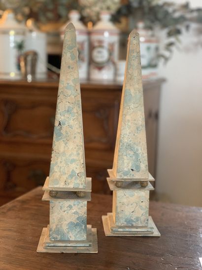 null Pair of obelisks made of cardboard and paper with imitation marble decoration.

Neoclassical...