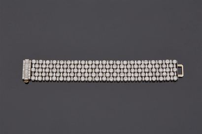  Bracelet en or gris 18 k (750 millièmes) et platine serti de 103 diamants de taille...