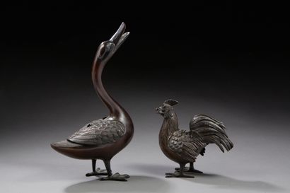 null Deux brûle-parfums en bronze représentant un canard et un coq.

Travail asiatique...