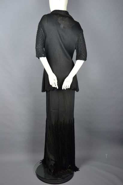 null *LACROIX

Long dress in black viscose, thin straps, round openwork neckline...