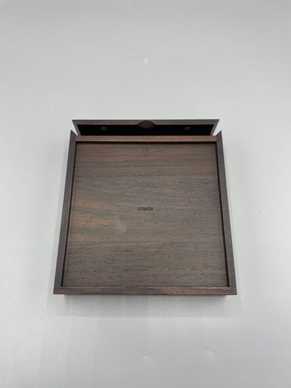 null 
HERMES Paris

Tangram game in rosewood in its box with sliding magnetic lid,...