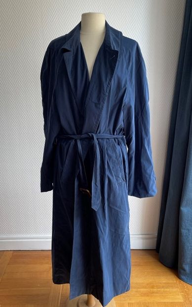 null HERMES Paris

Blue waterproof overcoat, long sleeves, notched shawl collar,...
