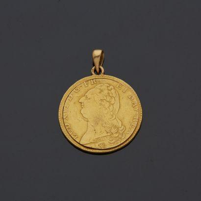 null Pendentif en or jaune 18 k (750 millièmes) à décor d'un buste de Louis XVI.

Poids...