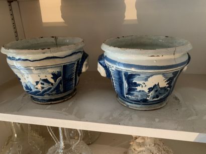 null Pair of earthenware flowerpots with blue and white landscape decoration. Two...