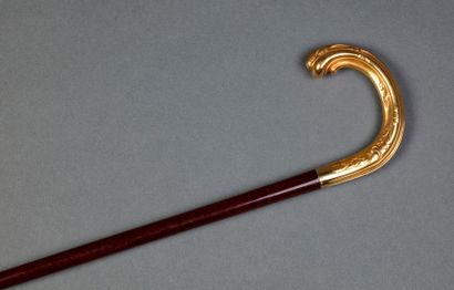 null Speckled mahogany shaft, the pommel in vermeil with foliage decoration (small...