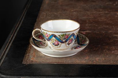 null Porcelain cup with handle and saucer decorated with a blue ribbon, garlands...