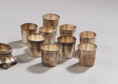 null Nine small liqueur glasses of different sizes, decorated with nets.

Different...