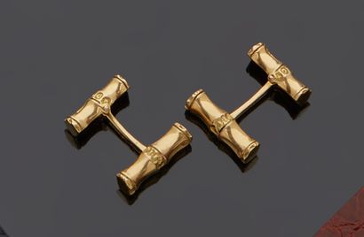 null Pair of cufflinks in yellow gold 18 k (750 thousandths) with bamboo pattern.

French...