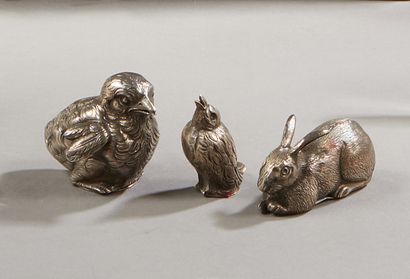null Three silver saltcellars representing a chick, a hare and a singing bird.

Total...