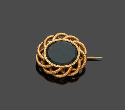 Brooch in yellow gold 18 k (750 thousandths)...
