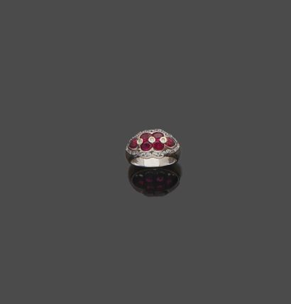 null Ring in white gold 18 k (750 thousandths) set with six red stones and white...