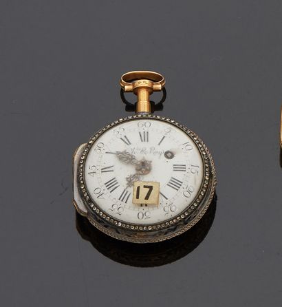 null Montre en or jaune à décor de frises feuillagées, décor émaillé au revers d'une...