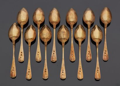null Set of twelve small spoons in vermeil, curved spatula.

Marked with a "cock"...
