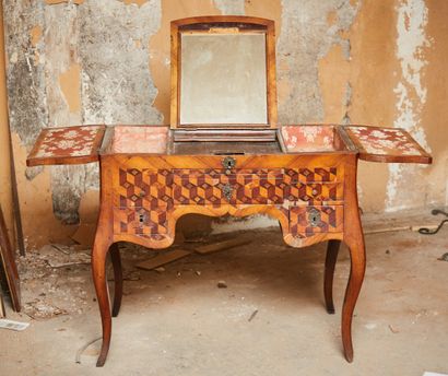 null Veneer dressing table decorated with a marquetry of geometrical cubes and floral...