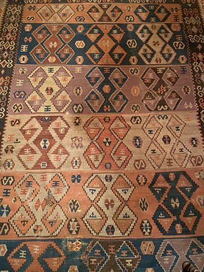 null Large Caucasian carpet with geometric patterns, polychrome border with stylized...