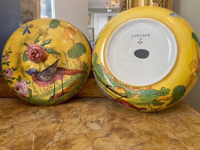 null Porcelain covered bowl with yellow background decorated with birds, roses and...