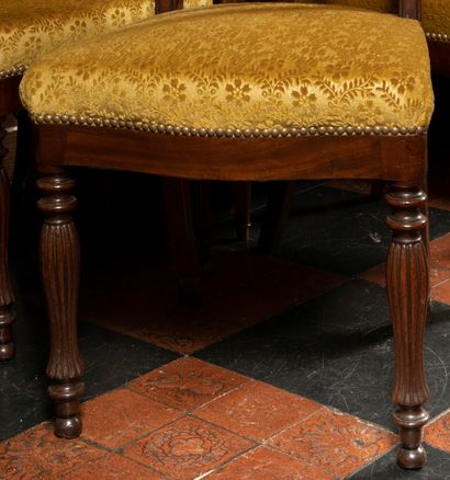 null 
Suite of sixteen mahogany dining room chairs carved with openwork back said...