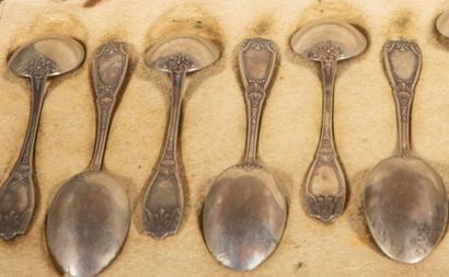 null 
Twelve small silver coffee spoons, the handle decorated with acanthus leaves,...
