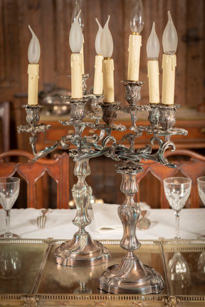 null 
Pair of candelabras in silver plated bronze with four arms of light, each candelabra...