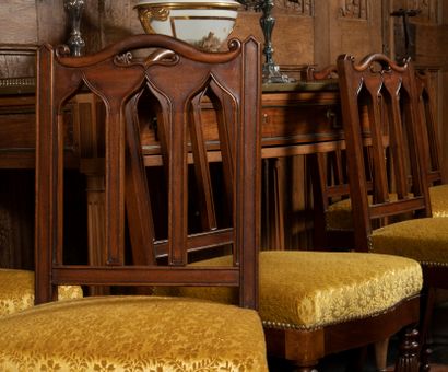 null 
Suite of sixteen mahogany dining room chairs carved with openwork back said...