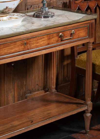 null 
Mahogany and mahogany veneer console table opening with a drawer in the waist,...