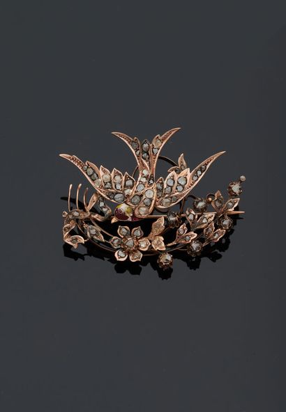  Brooch trembleuse bird in yellow gold 18 k (750 thousandths) set with small diamonds...