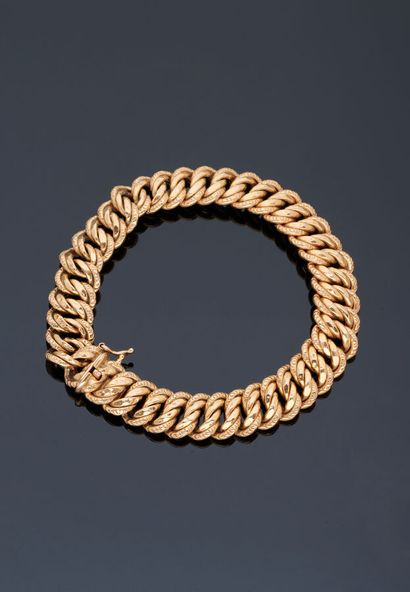 null Bracelet gourmette in yellow gold 18 k (750 thousandths).

Weight : 18.9 g -...